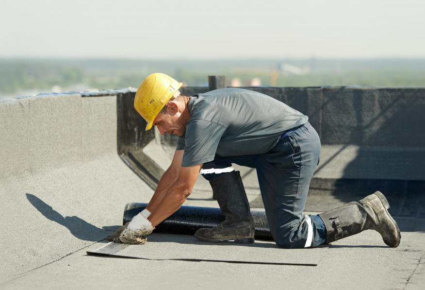 Man working on roof repairs